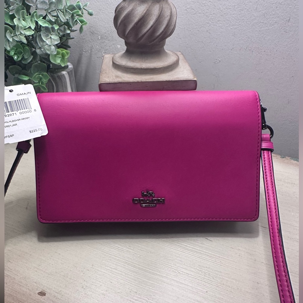 Coach Pink Crossbody Wallet On A Strap 8”x 5”x 1 1/4”.